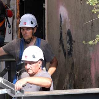 Venice installs scaffolding to preserve Banksy’s fading ‘Migrant Child’ mural