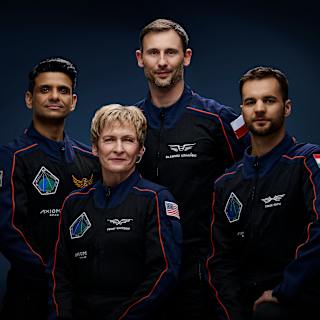 Historic international crew launches to space station