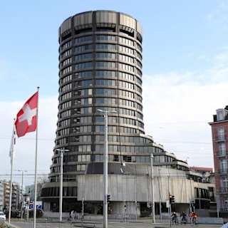Global economy at 'crossroads' as inflation fears mount