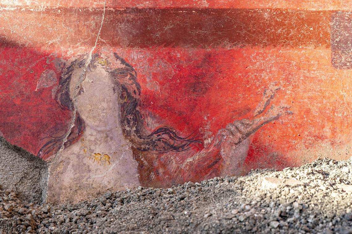 Rare frescoes unearthed in Pompeii shed light on ancient ...