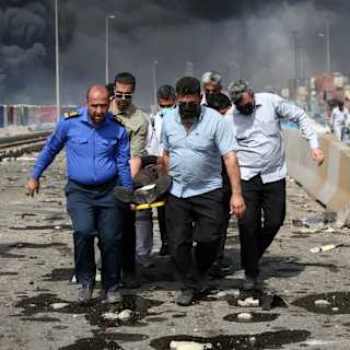 25 killed in Iran port blast fires still burning