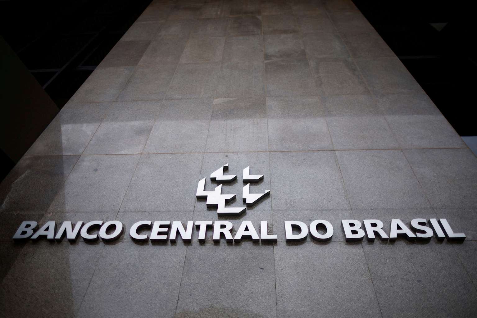 Brazil central bank raises rates, sees 'very prolonged ...
