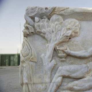 Ancient Roman sarcophagus with Dionysus and Hercules found in Caesarea
