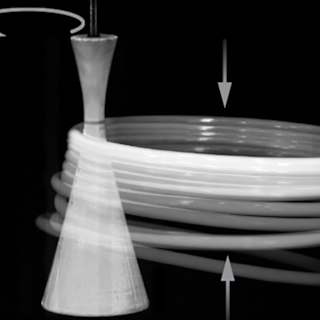 Hula-Hooping Robots Solve Physics Puzzle