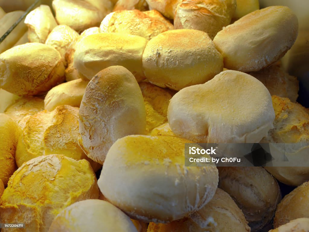 Warm fresh baked bread rolls stacked together