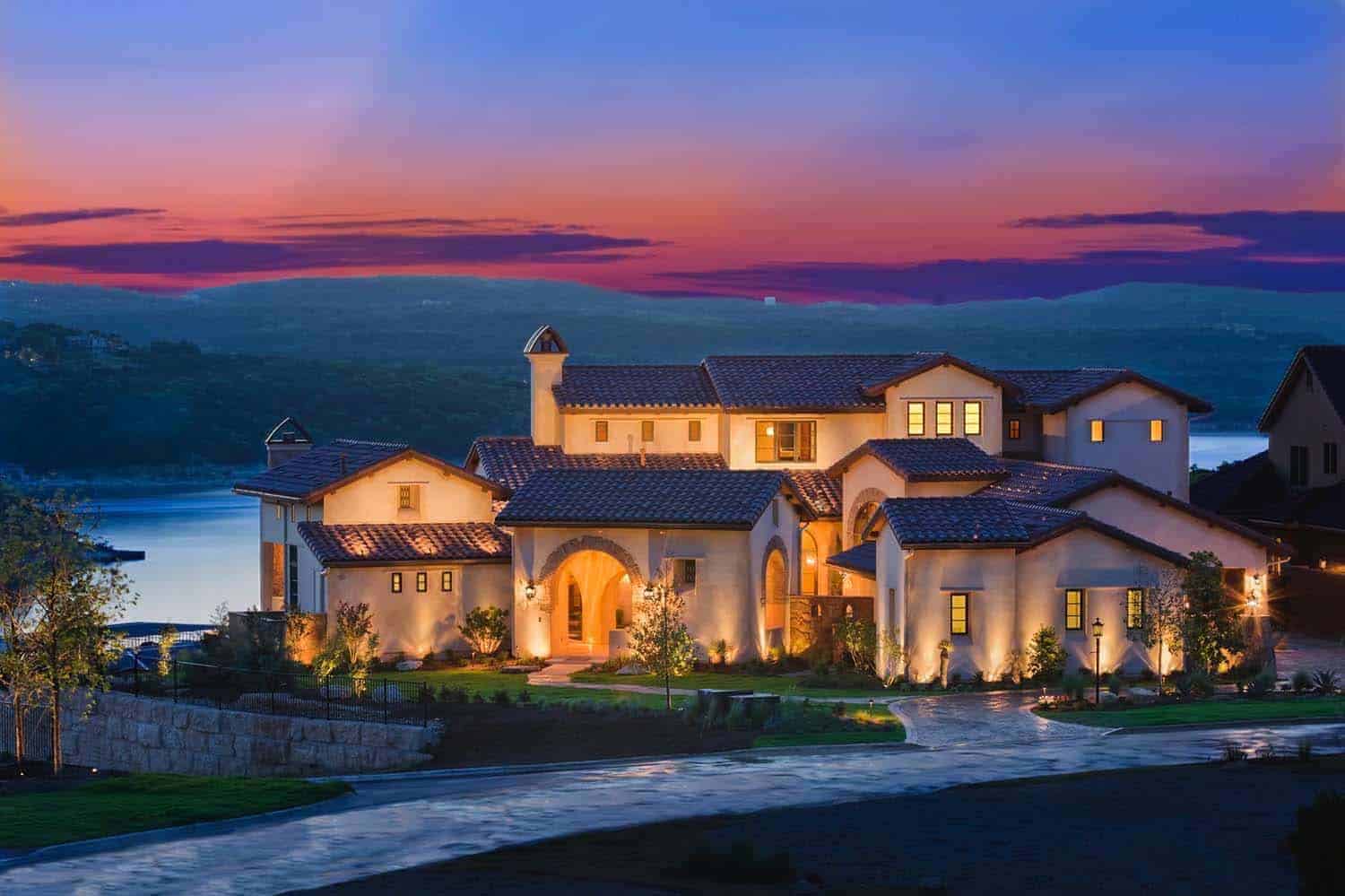 Another Santa Barbara-style home exterior at dusk