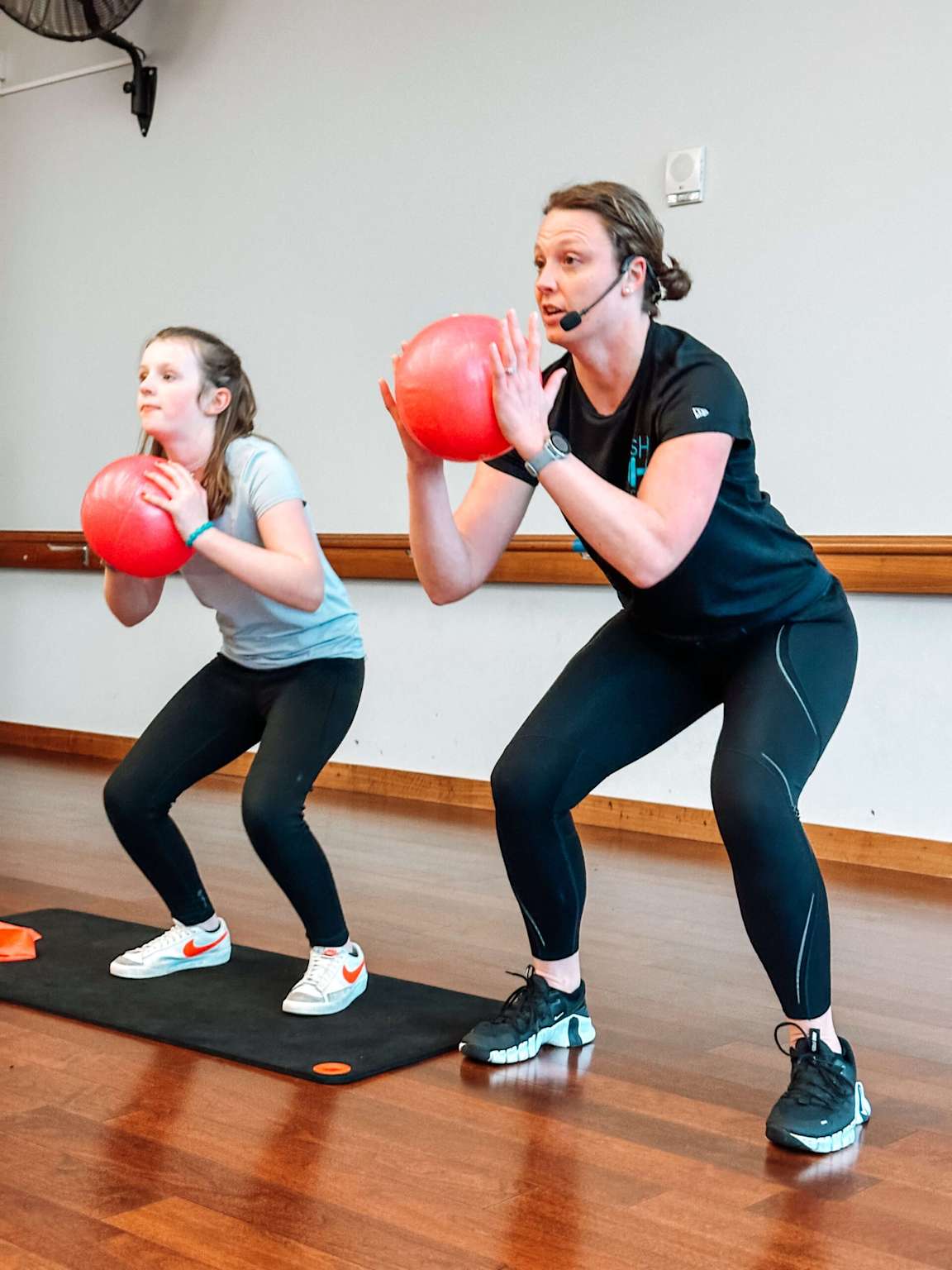 Teen fitness workout with medicine balls
