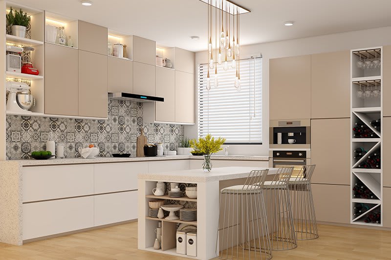 Modern kitchen with beige cabinets and pendant lights