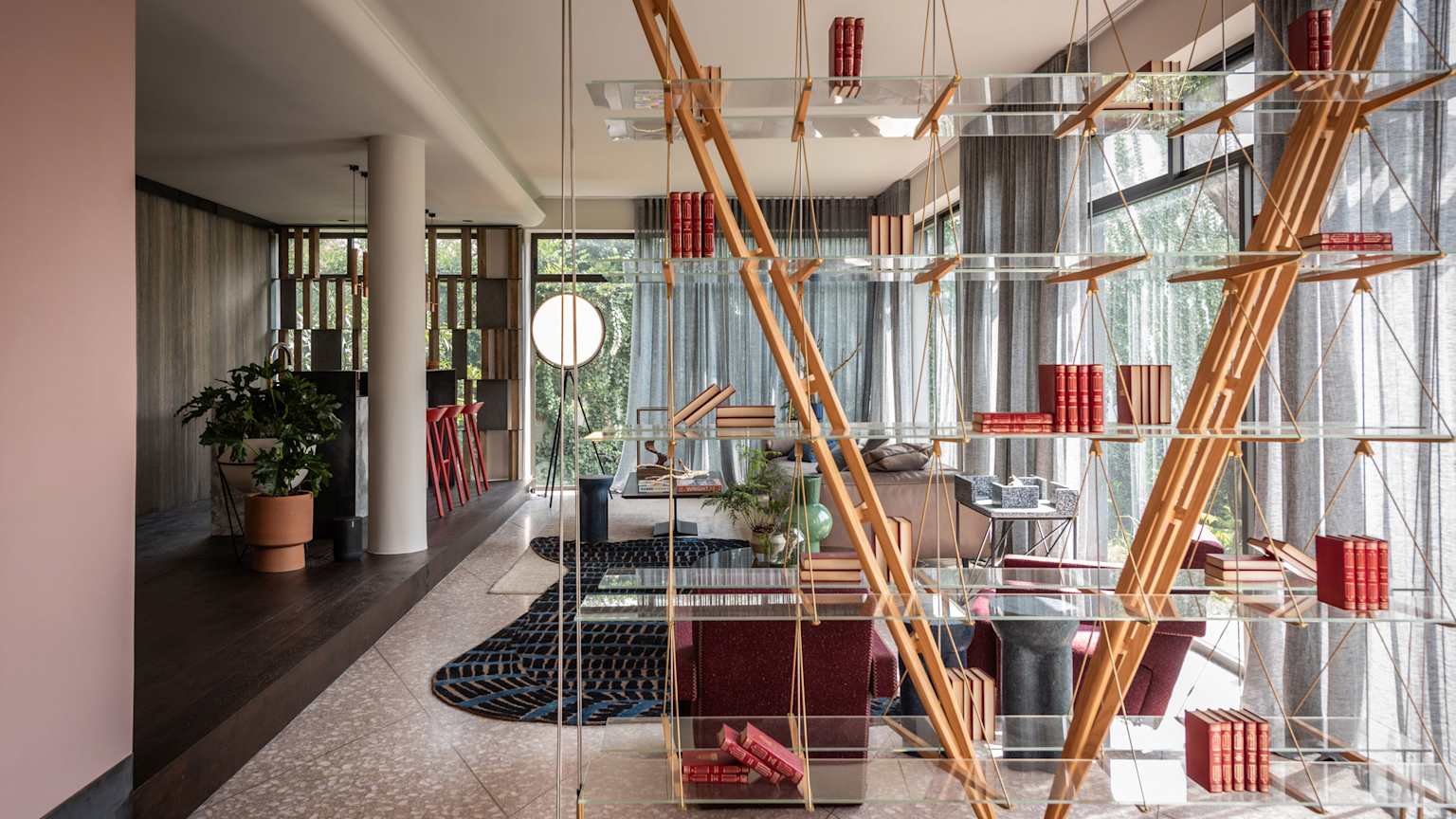 Modern studio space in Mexico City with natural wood, plants, and large windows