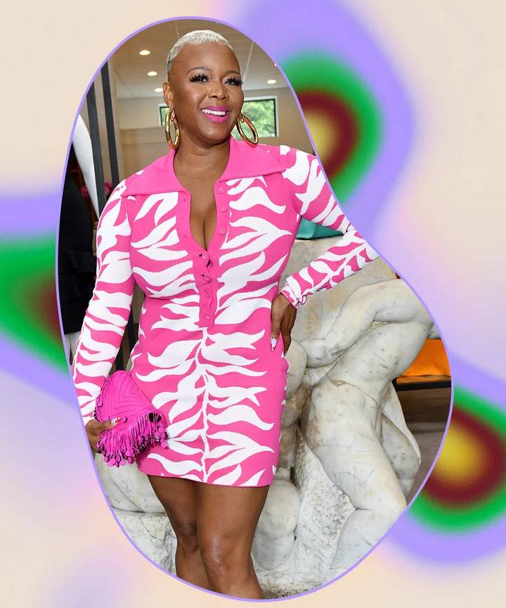 Claire Sulmers in pink zebra print dress