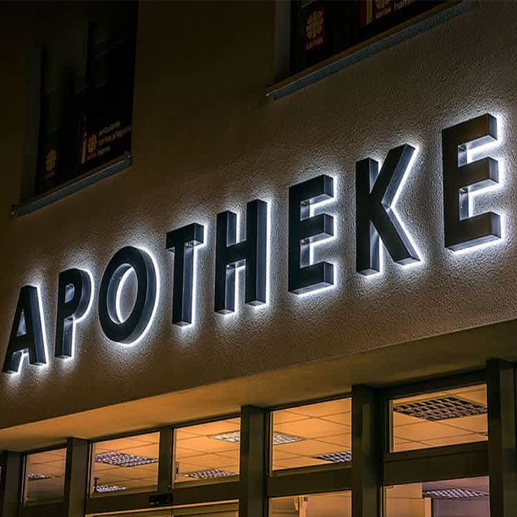 3D illuminated letters on a building facade