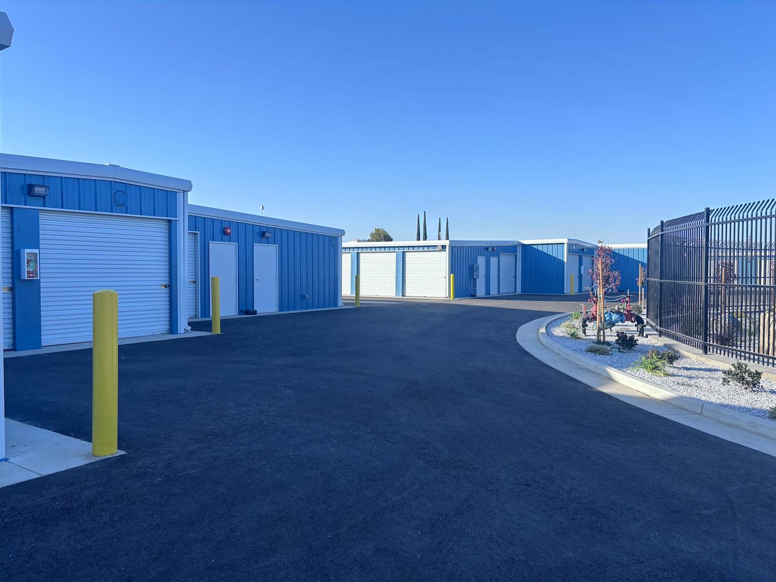 Clean rows of self-storage units under California sky