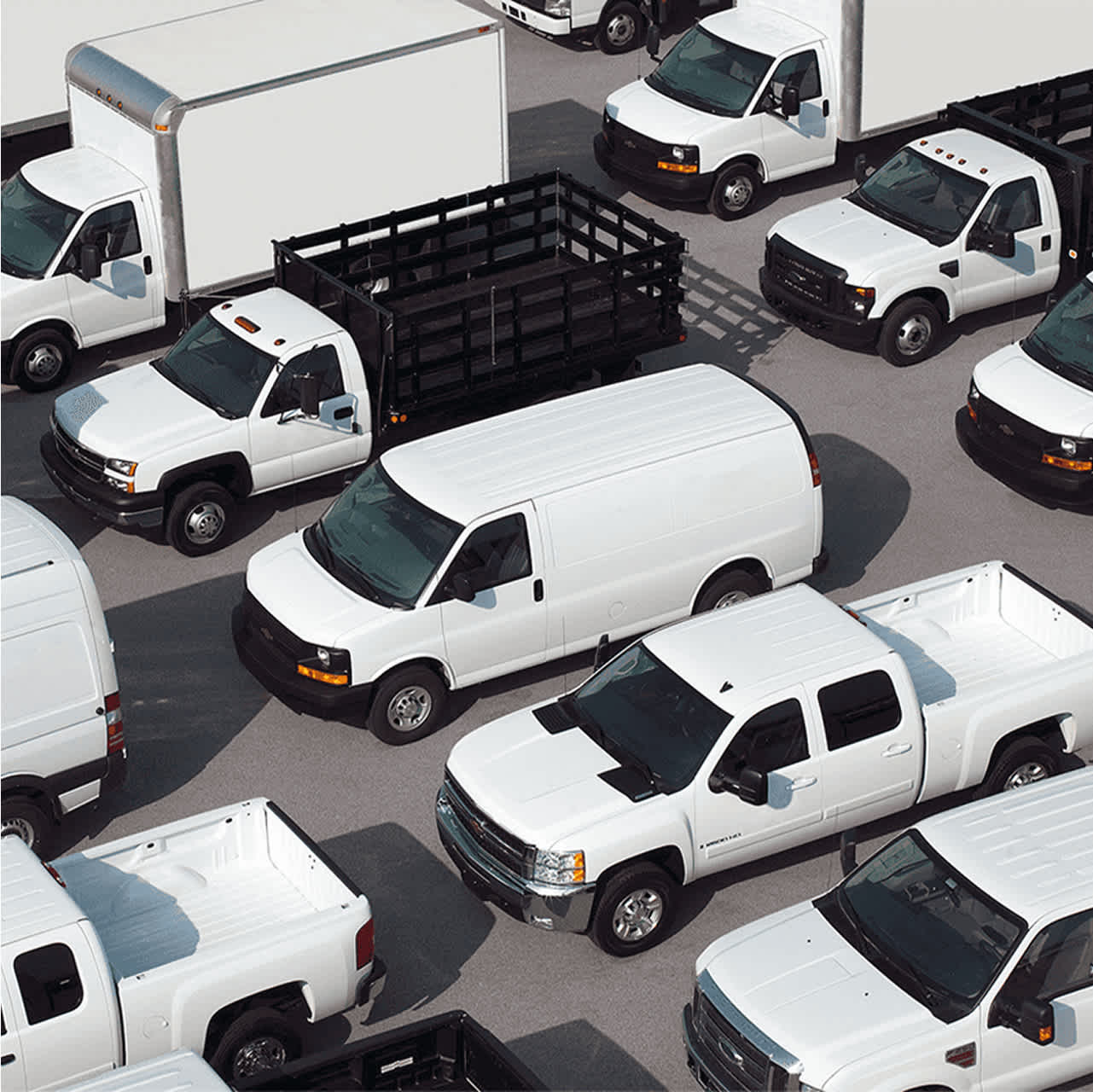 Aerial view of government fleet vehicles parked in a lot