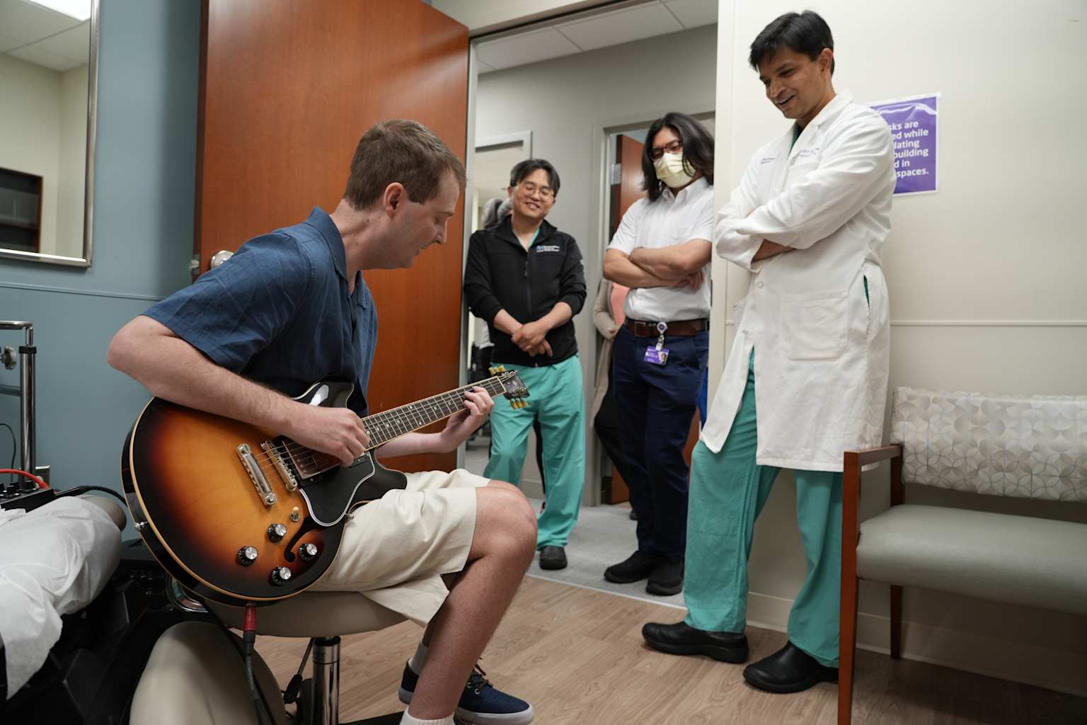 Dean performing for medical team