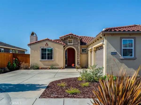Single-story Orcutt home with red tile roof and landscaped front yard