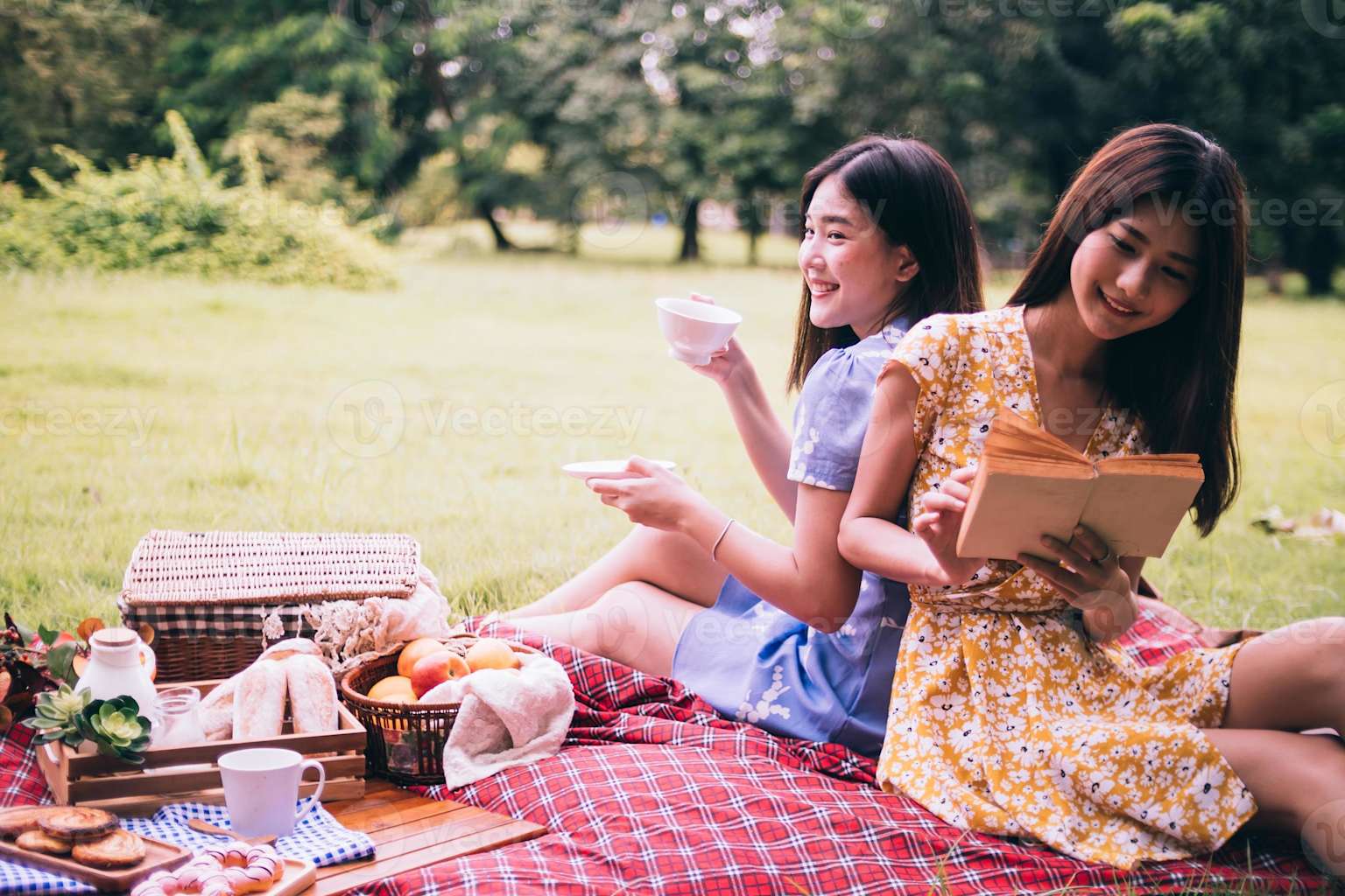 Friends having a picnic in the park