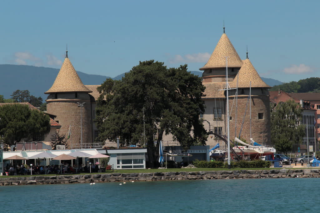 Chateau de Morges 1286 with conical towers lake Alps