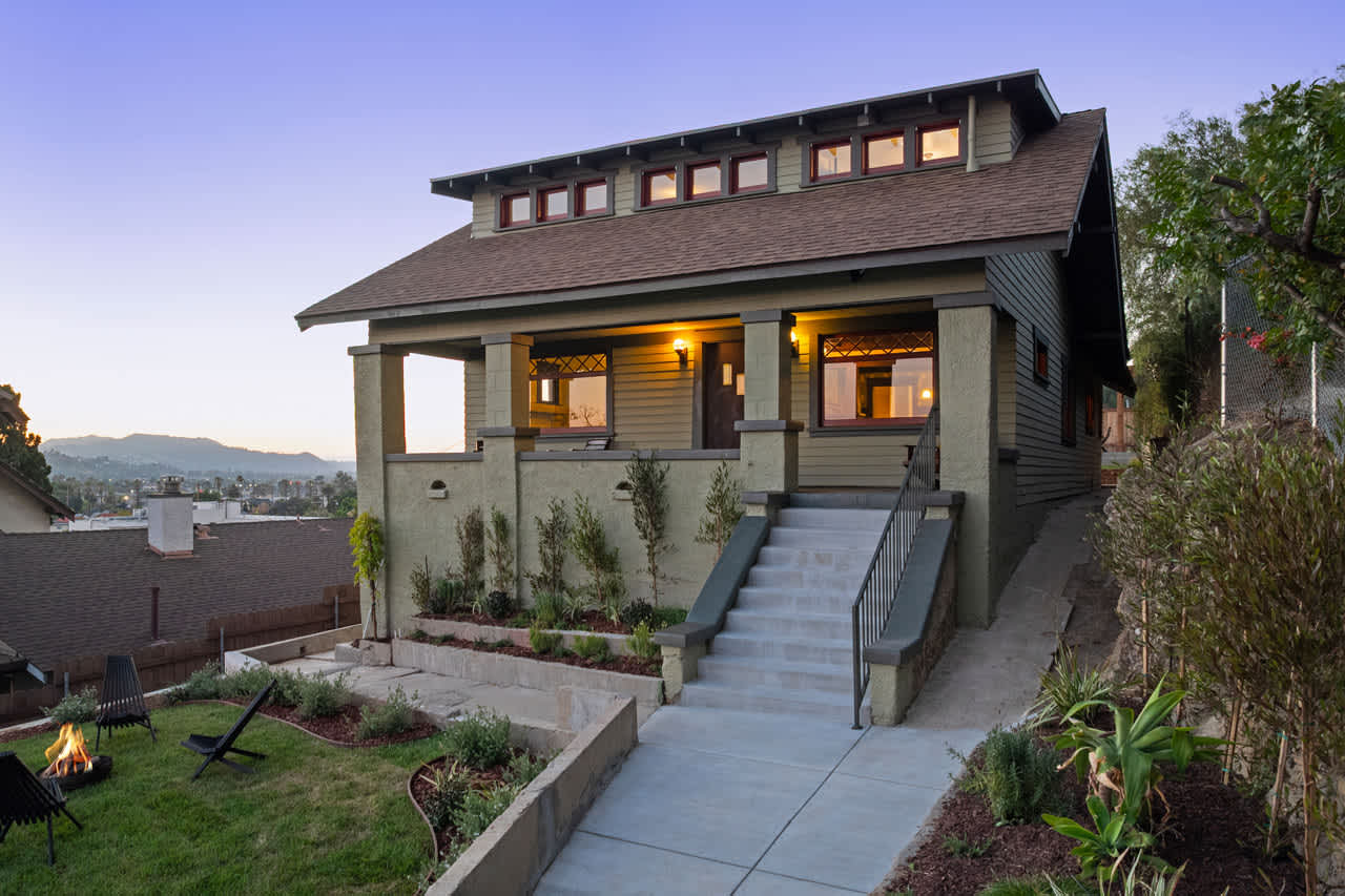 Open house home exterior at dusk