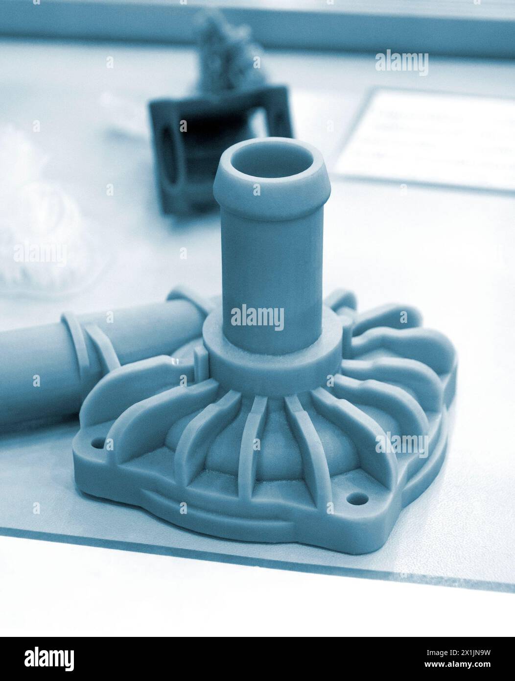 3D printed mechanical part in a workshop