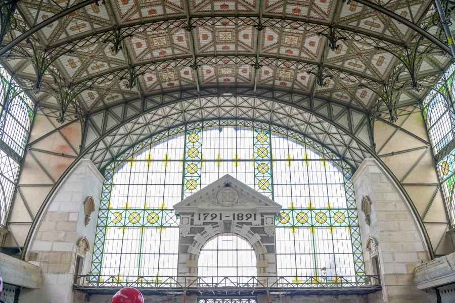 Ornate iron glass arched entrance hall restoration