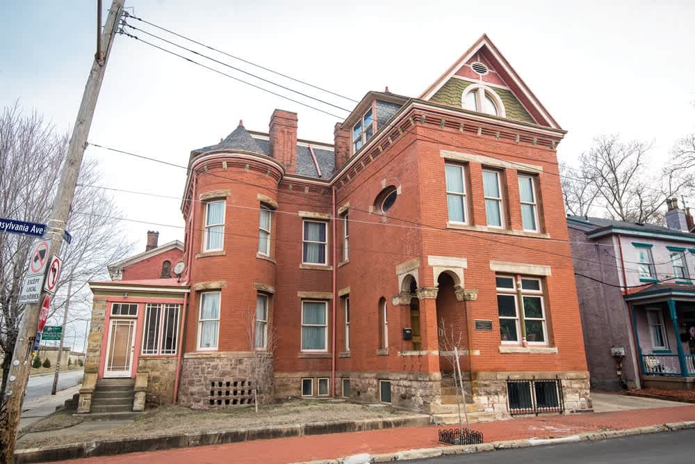 Renovated red brick row house in a Pittsburgh neighborhood