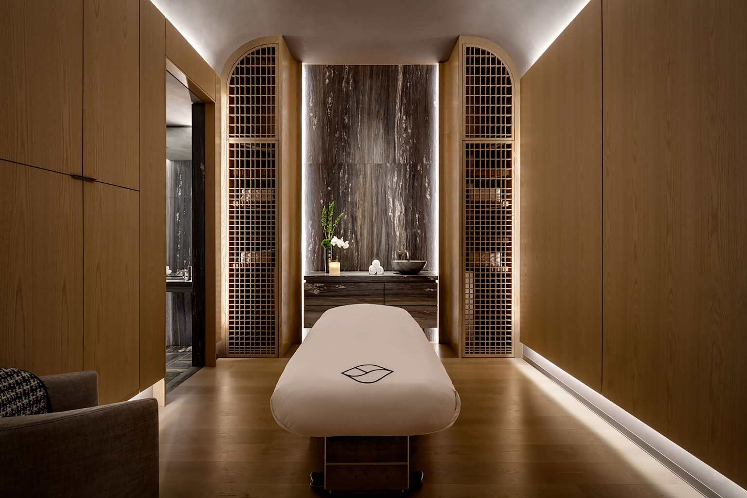 Luxury spa room with warm lighting and calm atmosphere