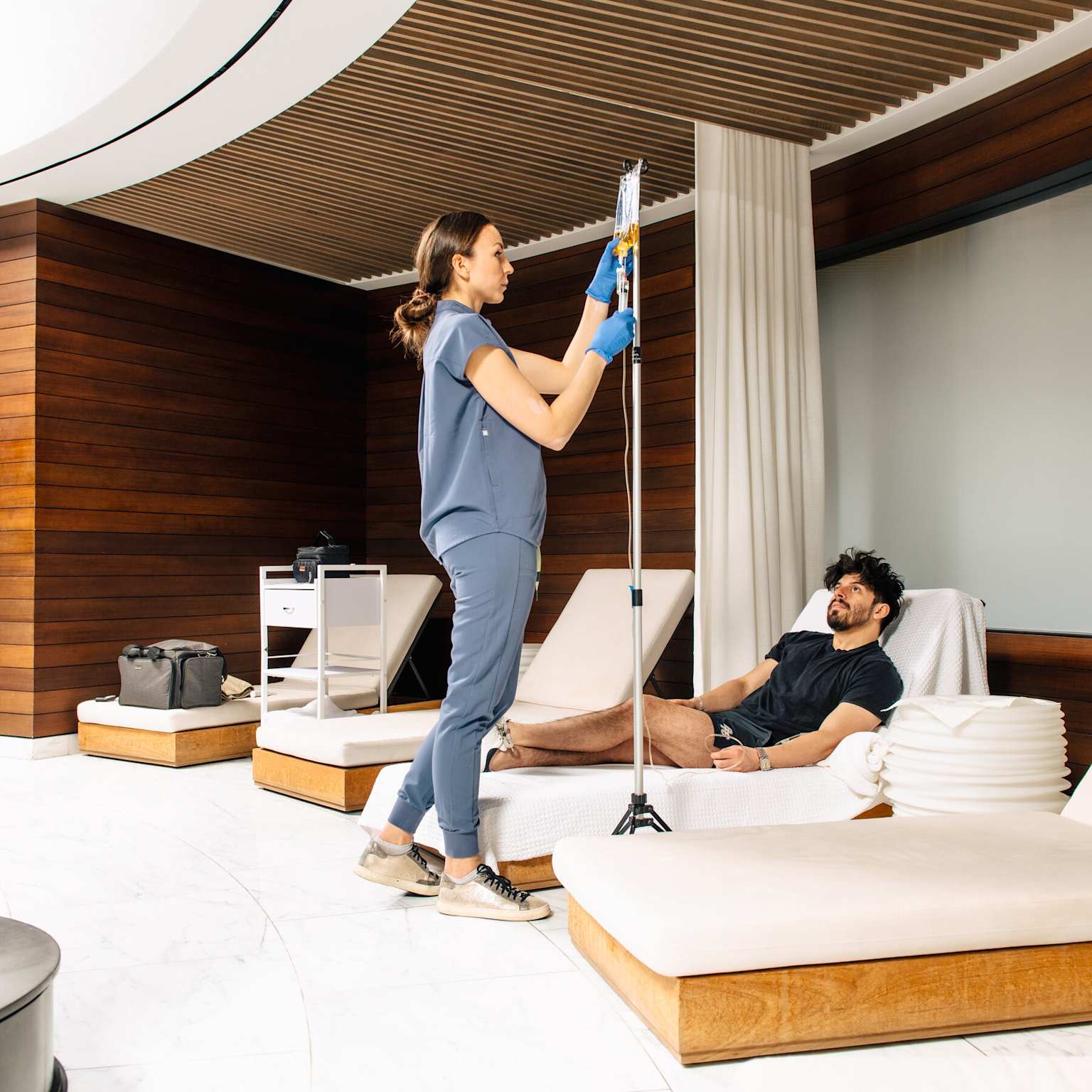 Luxury at-home IV infusion therapy in a serene lounge