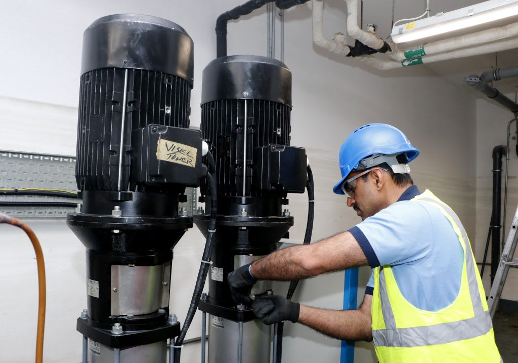 Plumbing maintenance industrial pipes Dubai technician