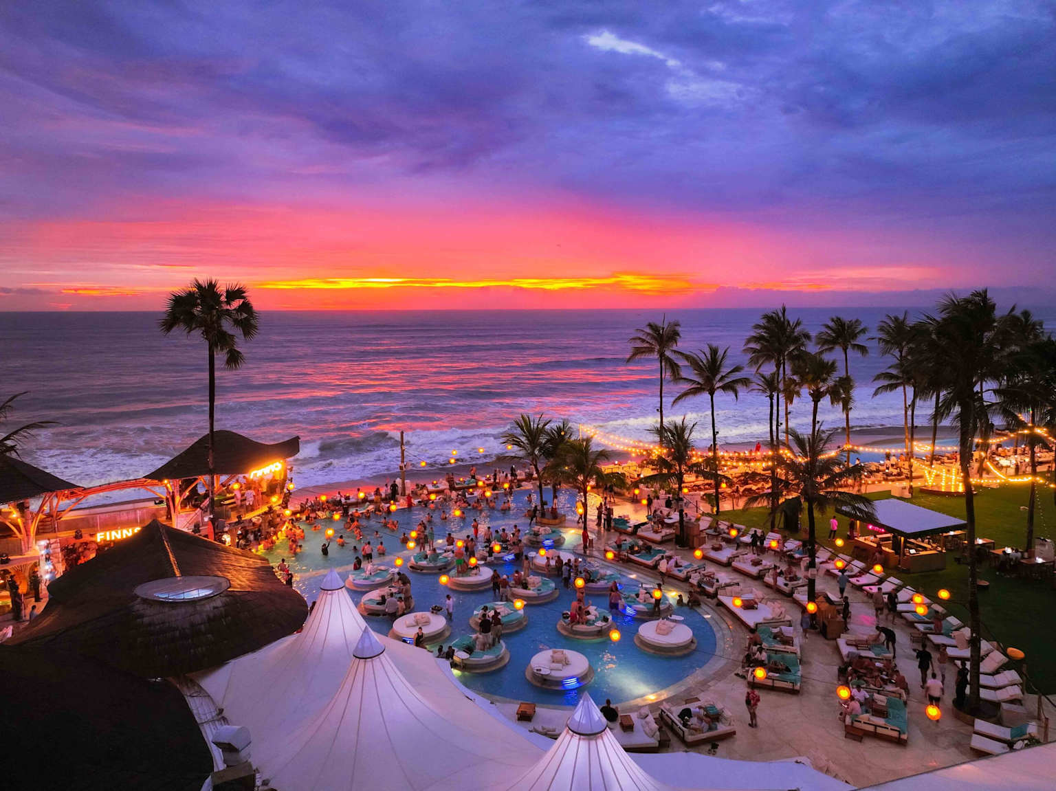 Aerial view of Finns Beach Club in Canggu, Bali at sunset