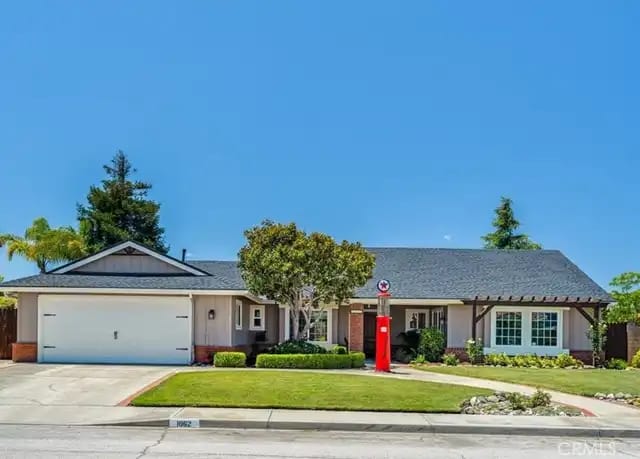 A suburban home in Orcutt with a front lawn and blue sky.