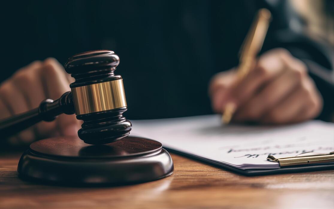 Signed legal document with gavel