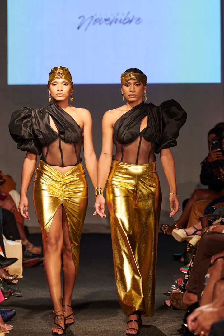 Claire Sulmers and Bomb Fashion Show models