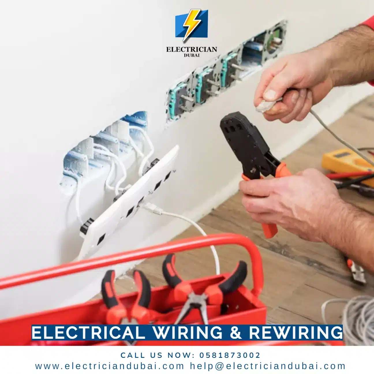 Electrician installing wall outlets electrical work Dubai