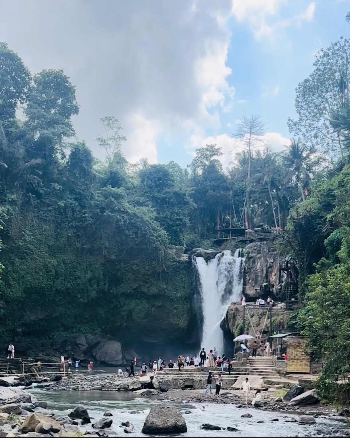 Waterfall in lush Ubud jungle, Bali