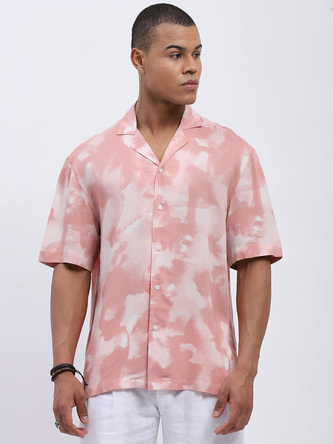 Men airport streetwear India — bold graphic tee with bomber jacket and dark slim jeans