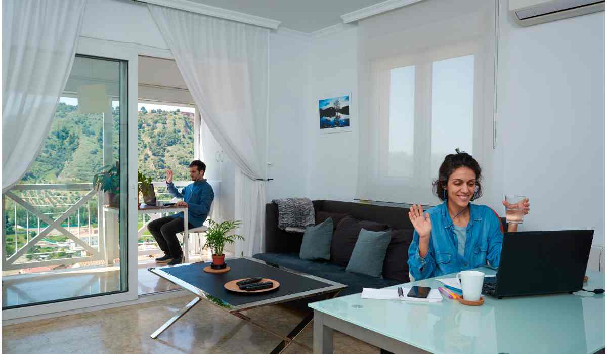 Young professionals in a bright co-living apartment