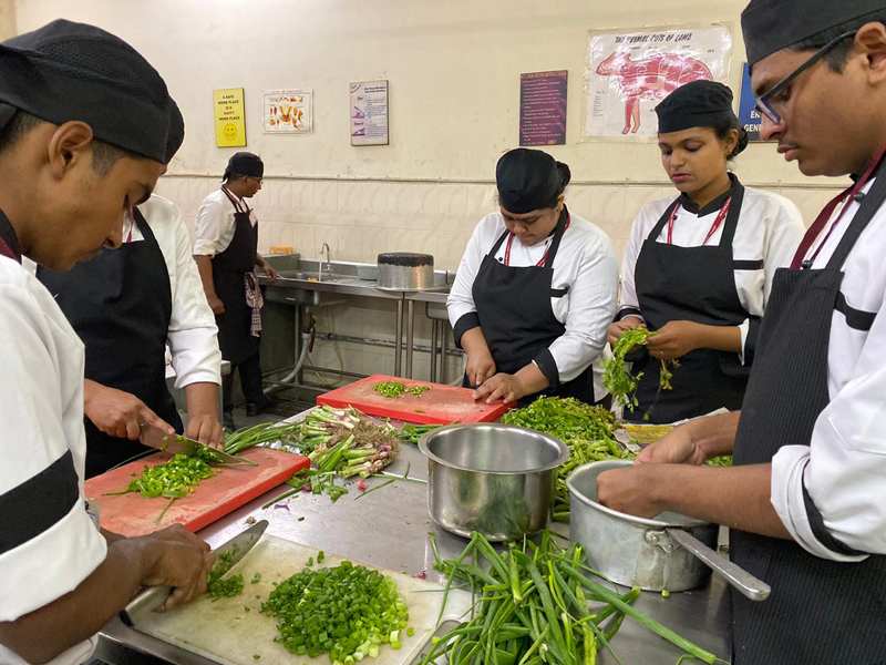 Hospitality students training in kitchen lab