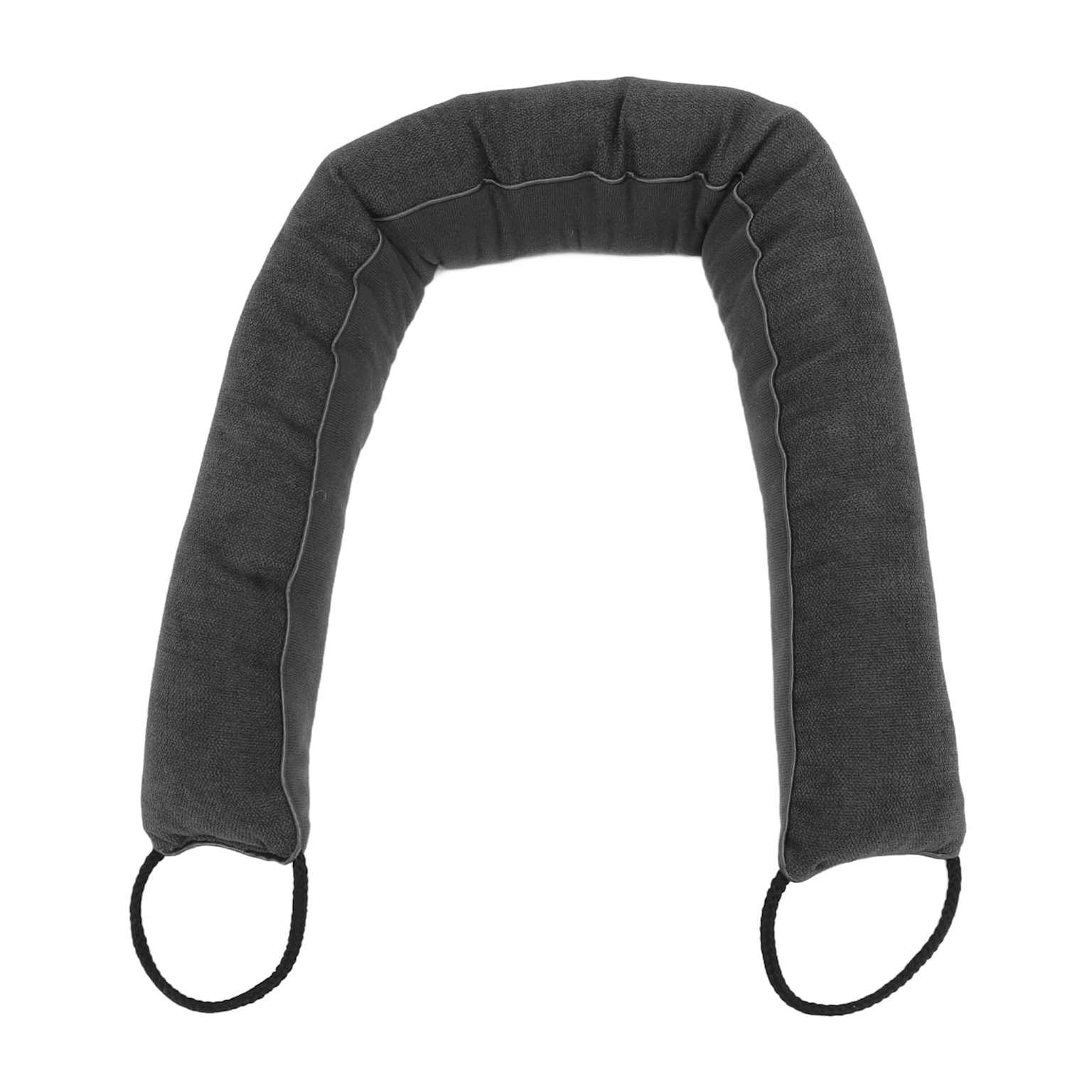 A simple fabric draft dodger snake placed under a door to stop cold air