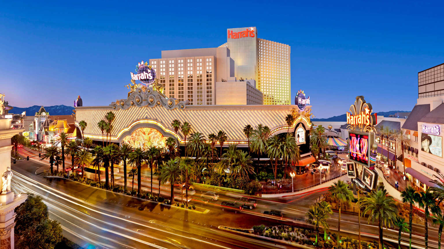 Aerial night view of Harrah's Las Vegas Hotel and Casino on the Strip
