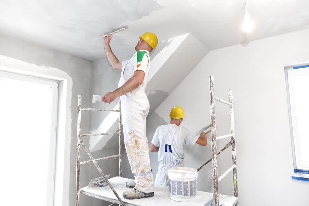 Painting team wall repair scaffolding Dubai UAE property