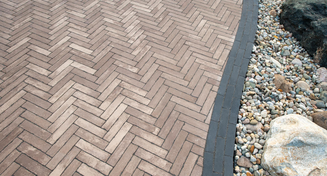 Detailed patio paver herringbone pattern and design
