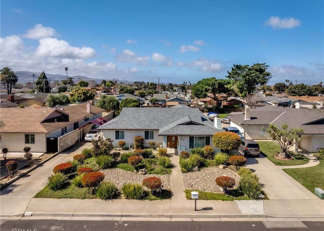 Suburban single-story home in Lompoc with a landscaped front yard