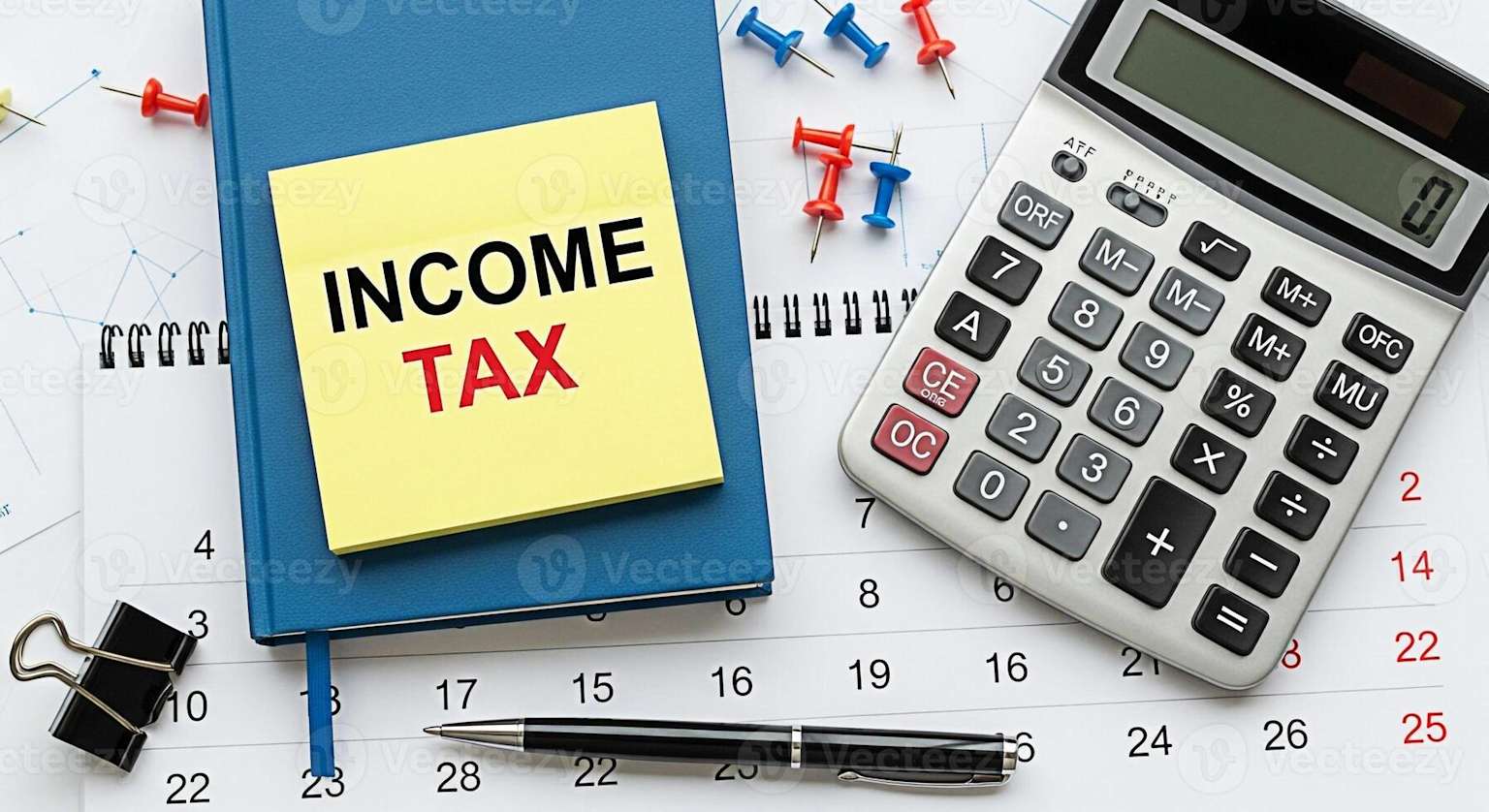 Tax planning calendar and calculator on desk