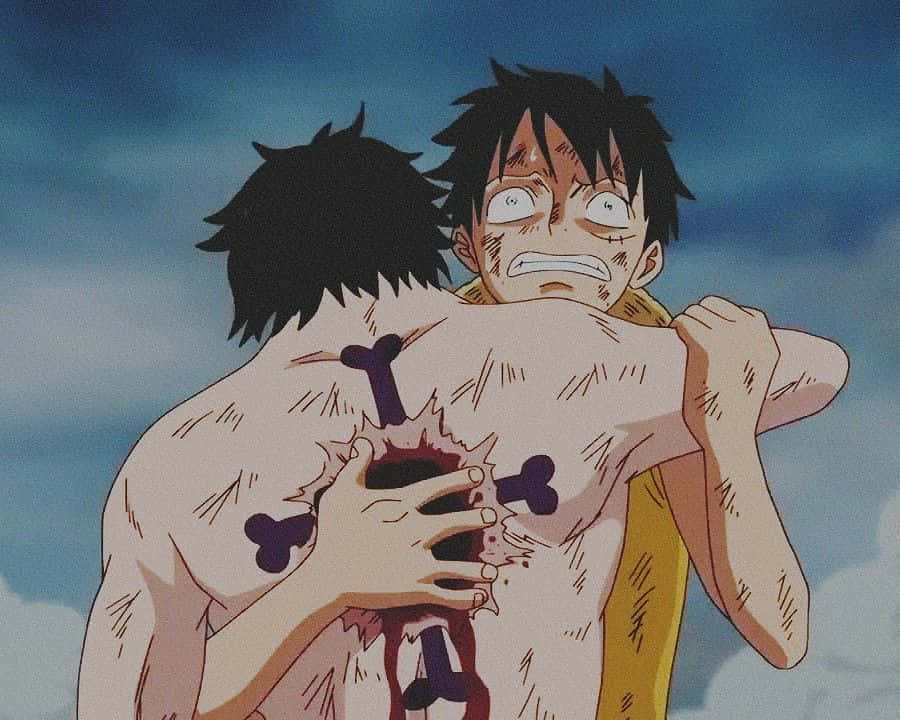 Portgas D Ace mort One Piece Marineford - Luffy tient son frère mourant