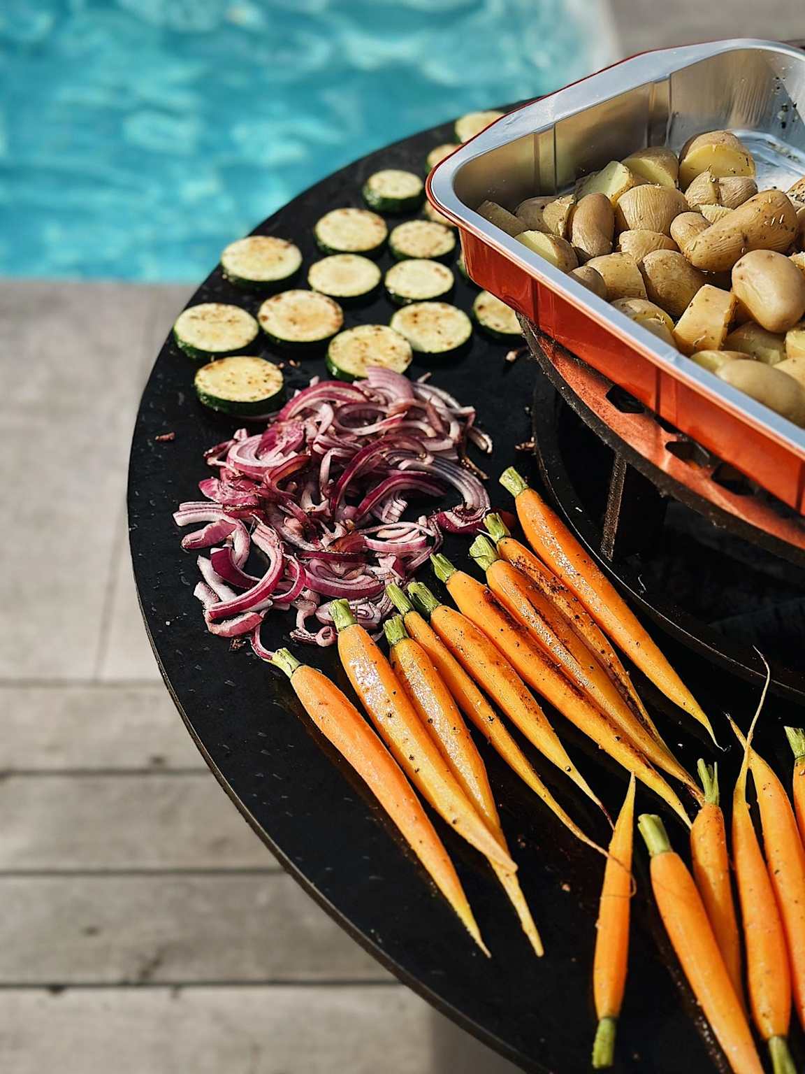 Tiger Fire plancha poolside