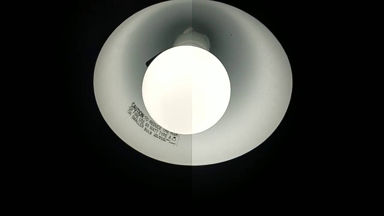 LED bulb emitting cool-toned light illustrating blue light therapy concept