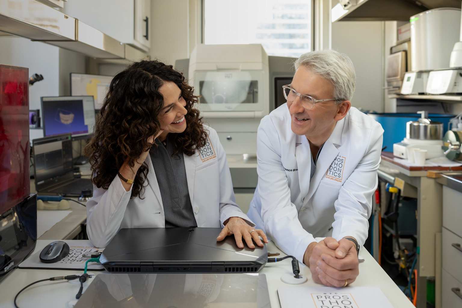 Dental professionals collaborating on research