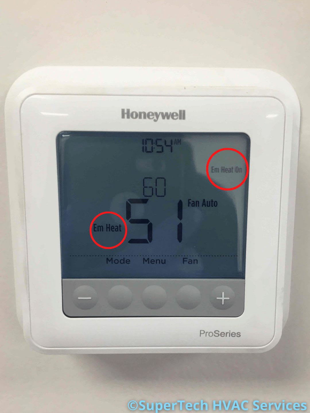 Thermostat screen showing Auxiliary Heat turning on, which drains electricity