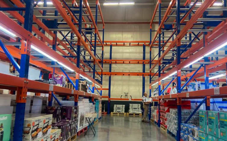 PriceSmart warehouse shelving aisles interior