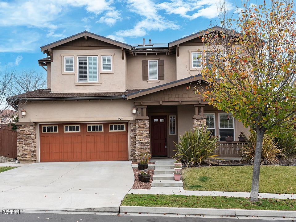 Suburban Lompoc home with front lawn and driveway